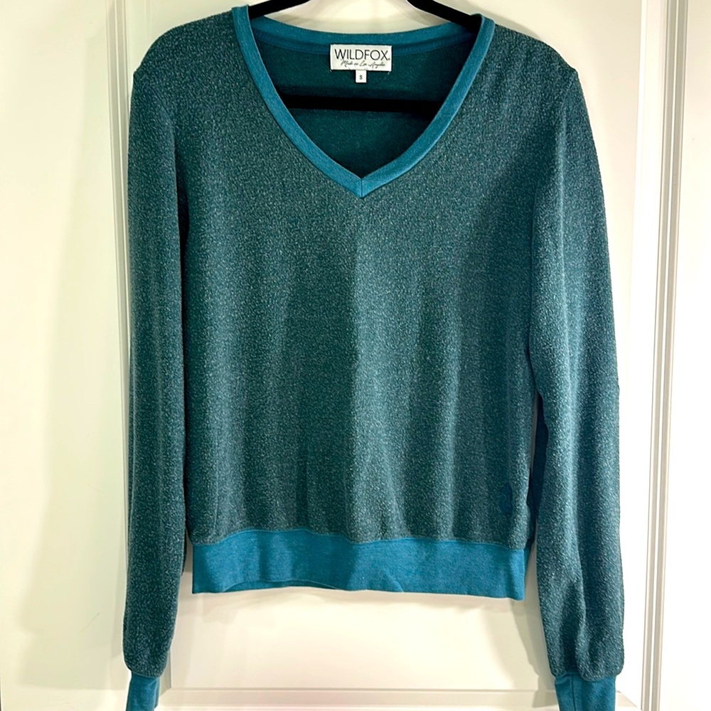 V-neck blue sweatshirt